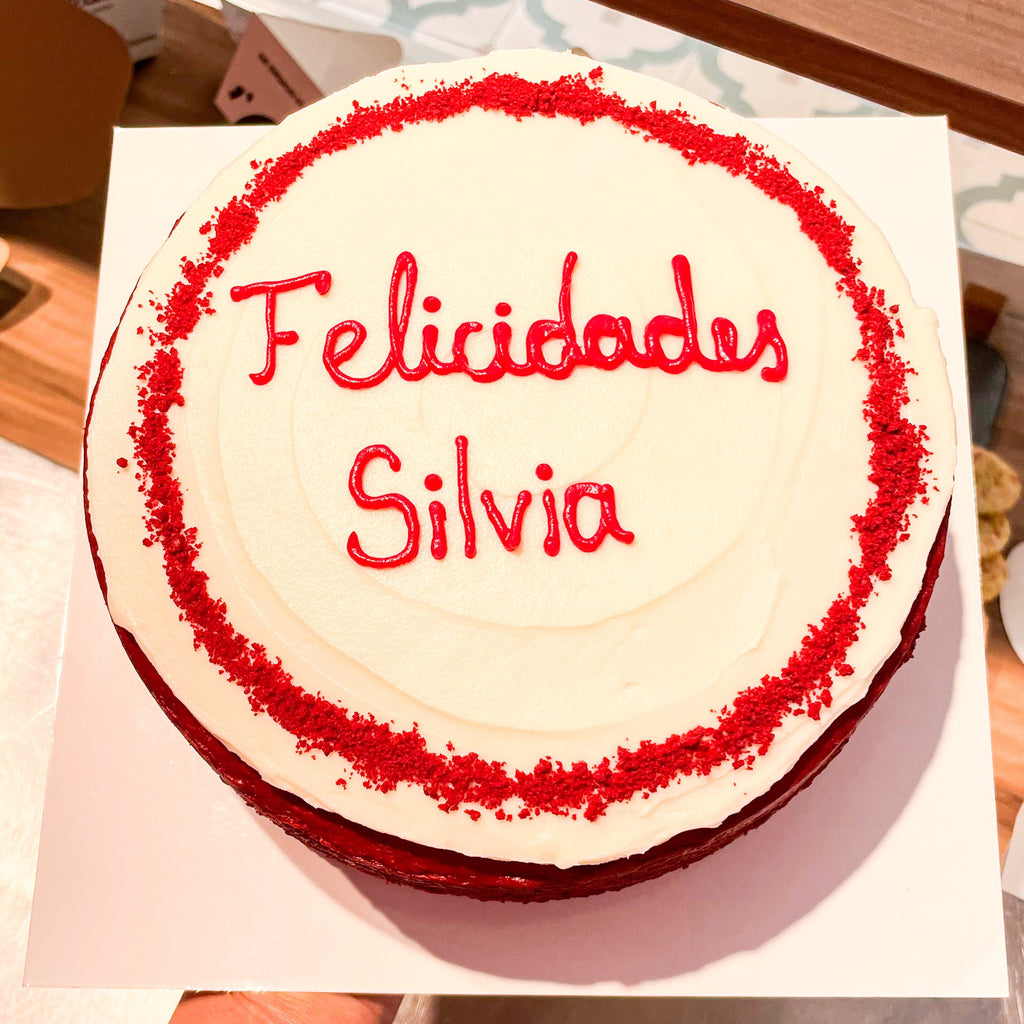 Red Velvet Cake with berries and creamy frosting