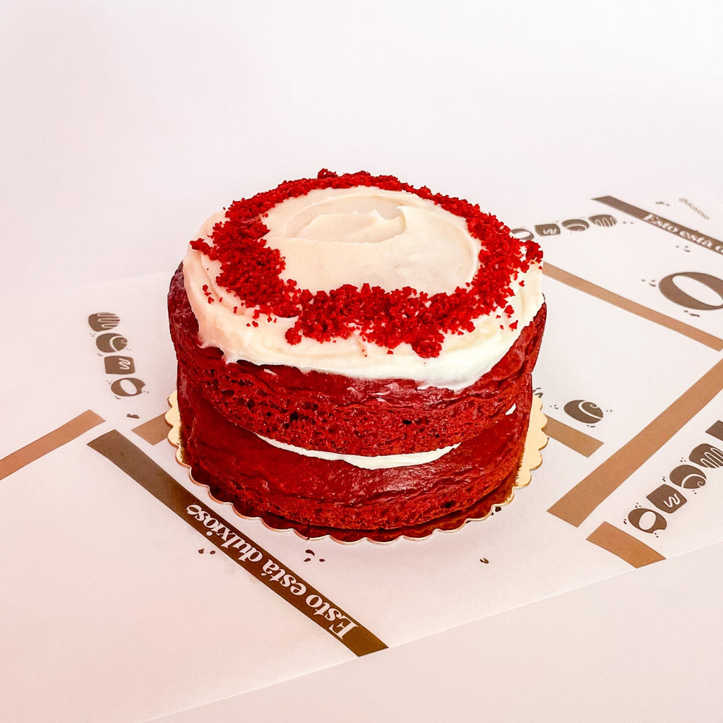 Red Velvet Cake with berries and creamy frosting